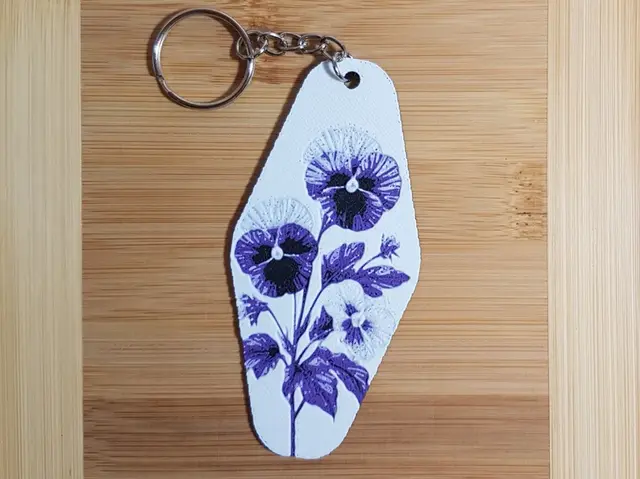 HueForge model: Keychain, Pansies, Hotel/Motel Style by Dame Jo