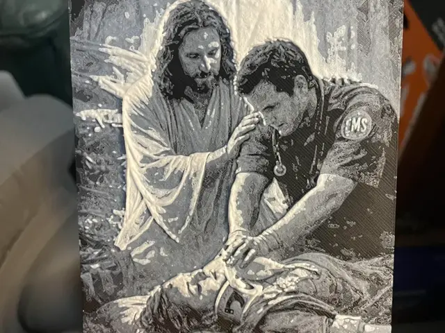HueForge model: Jesus heling an EMS Hueforge by Advancedtechworldwide